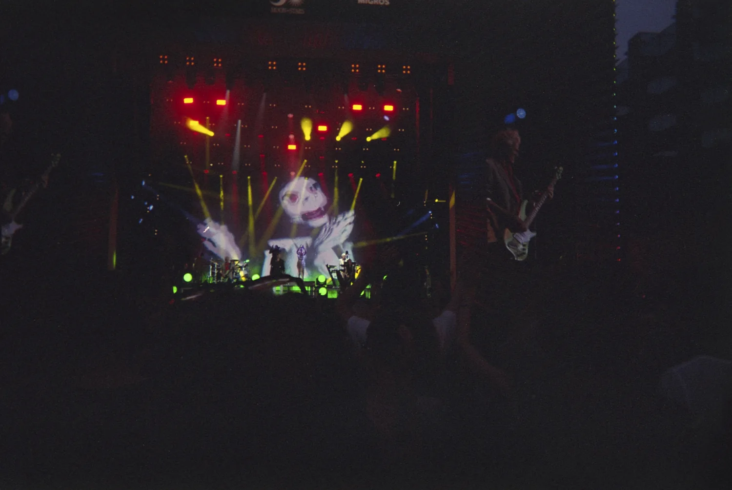 A concert stage lit up at night