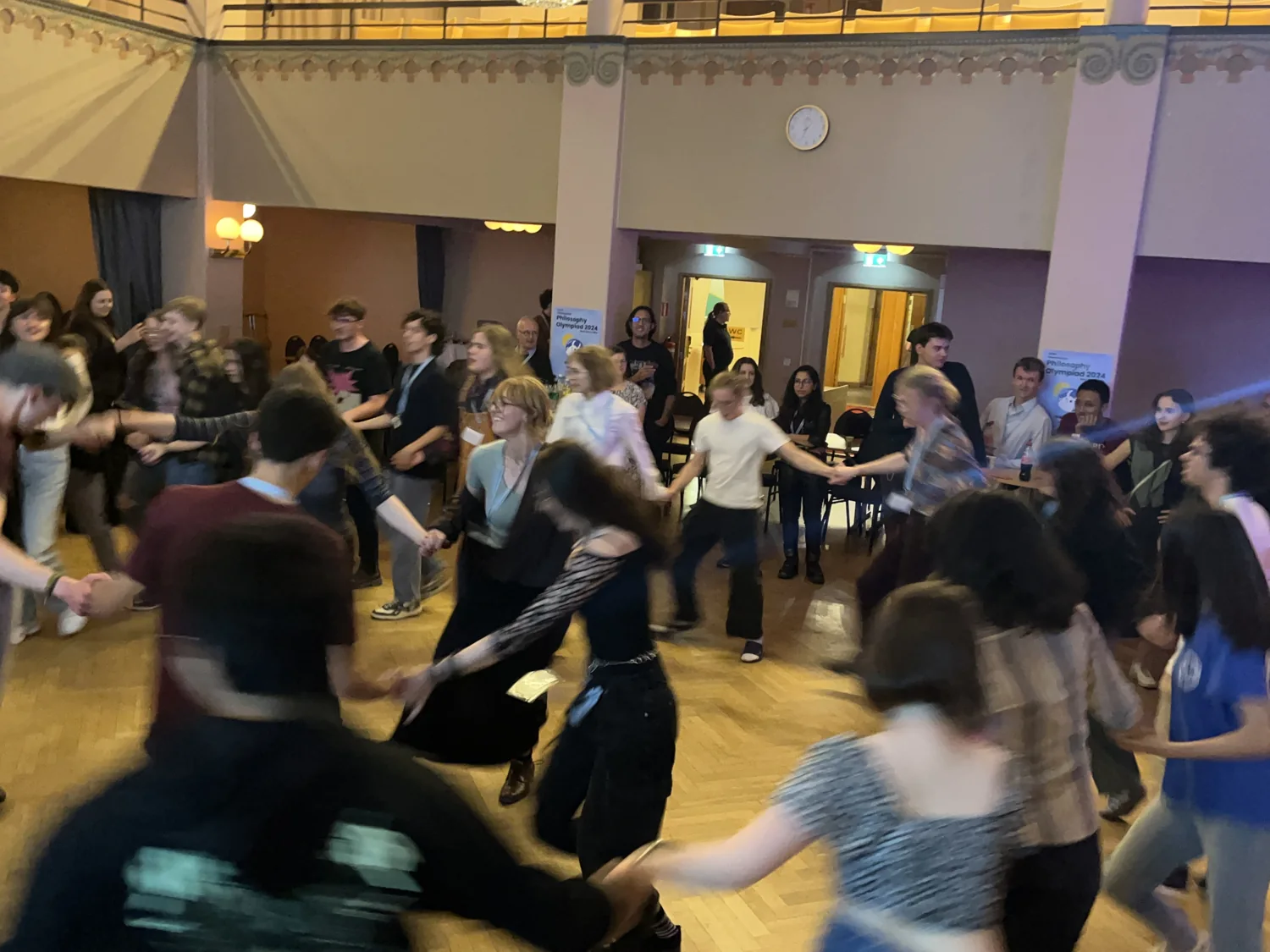A circle of dancers at the 2024 Philosophy Olympiad