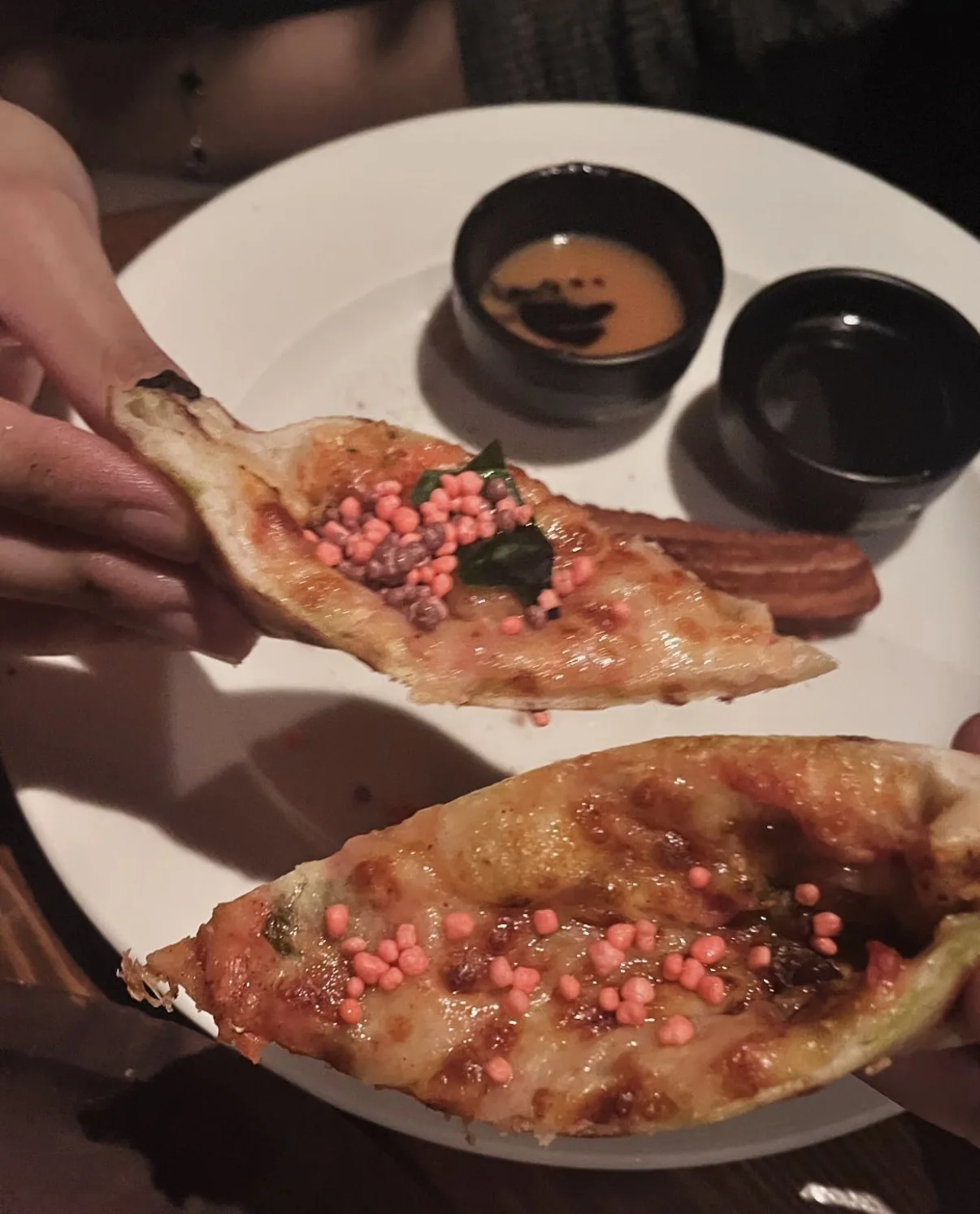 Sharing food with colourful toppings